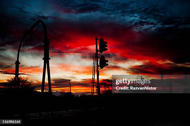 dramatic and powerful sunset over rail tracks - altea stock pictures, royalty-free photos & images