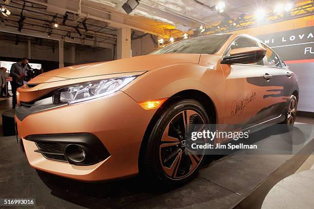 The 2016 Honda Civic Sedan with Demi Lovato's signature at the Honda Civic Tour Artists Announcement and Honda Civic North America Launch Event at...