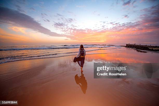 woman walking beach on the sunset - maspalomas imagens e fotografias de stock