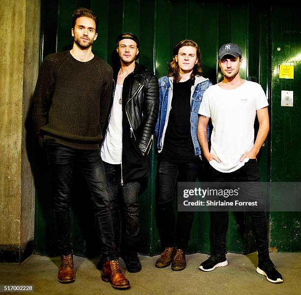 Andy Brown, Ryan Fletcher, Joel Peat and Adam Pitts of Lawson pose backstage before meeting fans and signing copies of their new single 'Money' at...