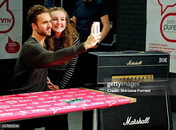 Andy Brown of Lawson meest fans and signs copies of their new single 'Money' at HMV on March 22, 2016 in Leeds, England.