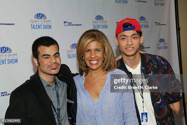 Television journalist Hoda Kotb poses with performers Ahmed Shareef and Ngawang Tseten during the 10th annual Garden of Dreams talent show rehearsals...