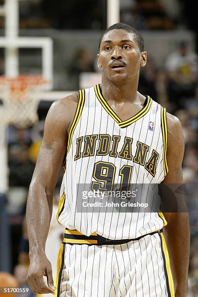 Ron Artest of the Indiana Pacers looks on while facing the Denver Nuggets during the preseason game at Conseco Fieldhouse on October 29, 2004 in...
