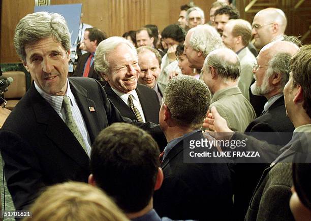 Senators John Kerry , D-MA, and US Sen. Joe Lieberman , D-CT, greet supporters 18 April, 2002 on Capitol Hill in Washington, DC after the Senate...