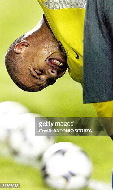 Ronaldo Nazario, known as Ronaldinho, of the brazilian soccer team, stretches during practice 25 March 2002 in Fortaleza, Brazil. Ronaldo Nazario,...