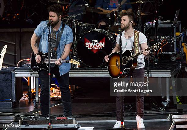 Zach Swon and Colton Swon of the Swon Brothers perform during The Storyteller Tour 2016 at The Palace of Auburn Hills on March 22, 2016 in Auburn...