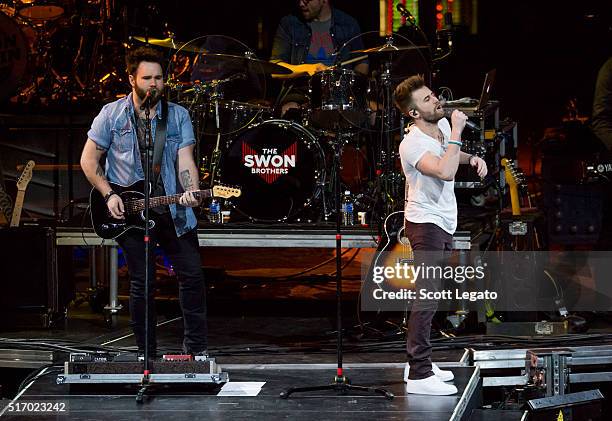 Zach Swon and Colton Swon of the Swon Brothers perform during The Storyteller Tour 2016 at The Palace of Auburn Hills on March 22, 2016 in Auburn...