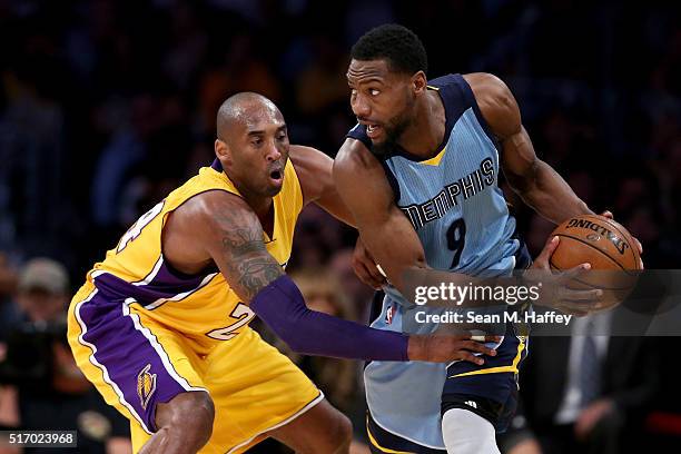 Kobe Bryant of the Los Angeles Lakers defends against Tony Allen of the Memphis Grizzlies during the first half of a game at Staples Center on March...