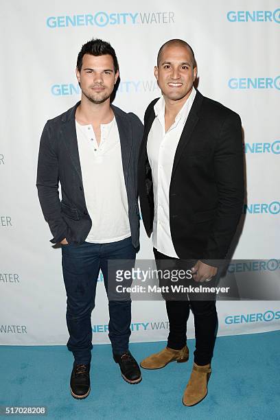 Actor Taylor Lautner and Co-founder of Generostiy Water Micah Cravalho attend the Generosity Water Launch at Montage Beverly Hills on March 22, 2016...