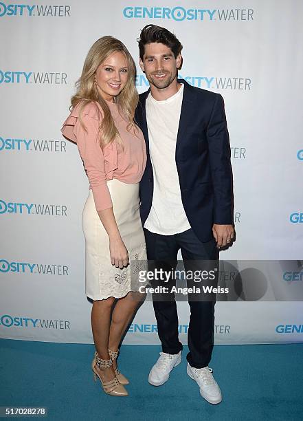 Actors Melissa Ordway and Justin Gaston arrive at the Generosity Water Launch at Montage Beverly Hills on March 22, 2016 in Beverly Hills, California.