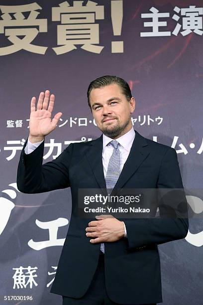 Leonardo DiCaprio waves at the press conference for 'The Revenant' at the Ritz Carlton on March 23, 2016 in Tokyo, Japan.