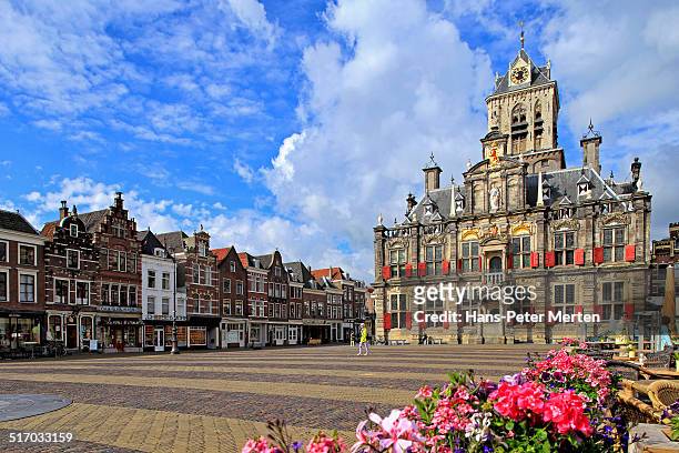city hall at market square, delft, netherlands - delft stock pictures, royalty-free photos & images