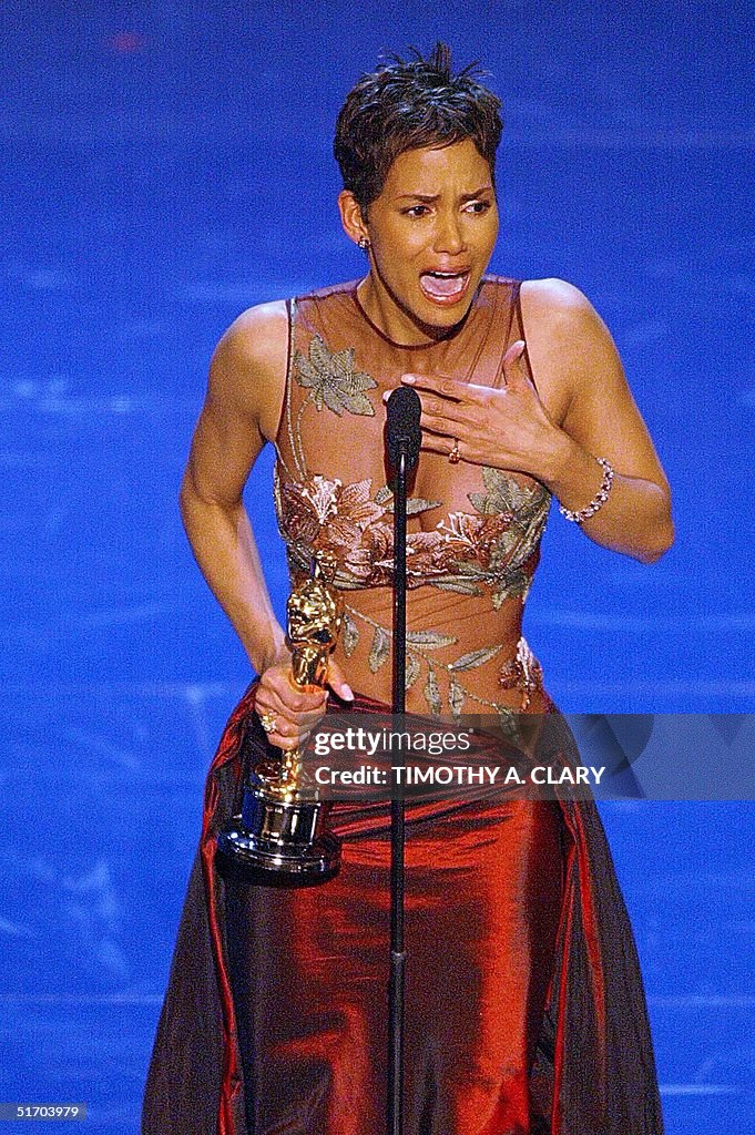 US actress Halle Berry accepts her Oscar for Best