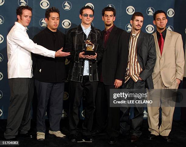 Linkin Park pose with the Grammy for Best Hard Rock Performance for their song "Crawling" at the 44th Annual Grammy Awards at the Staples Center in...