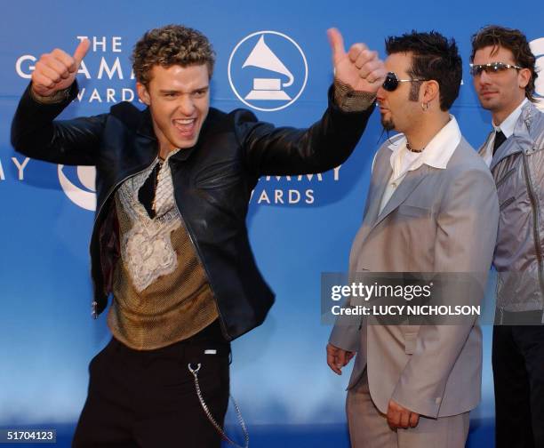 Singer Justin Timberlake , Chris Kirkpatrick and J.C. Chasez of the group NSync arrive at the 44th Annual Grammy Awards in Los Angeles, CA, 27...