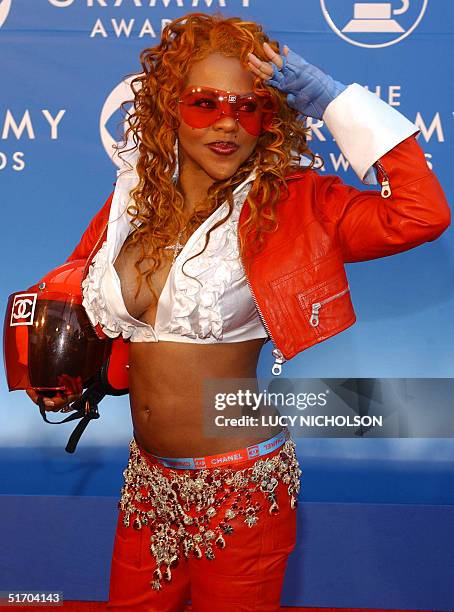 Singer Lil' Kim arrives at the 44th Annual Grammy Awards in Los Angeles, CA, 27 February 2002. AFP PHOTO/Lucy NICHOLSON