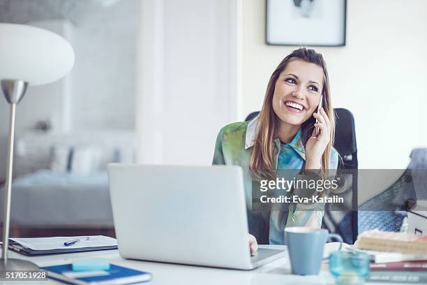 portrait of a content, smiling young woman - teleworking hipster stock pictures, royalty-free photos & images