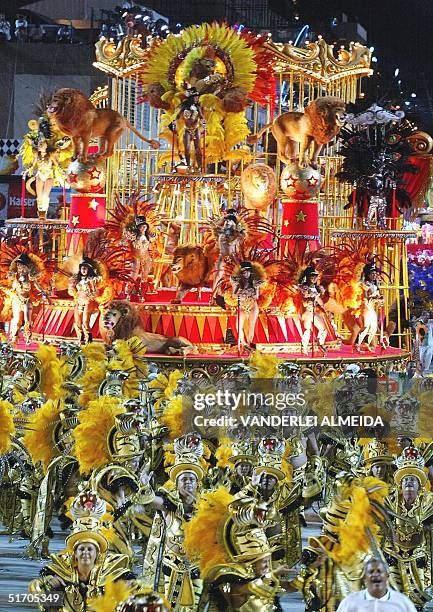 The Mocidade Independente de Padre Miguel samba school sing and dance at the carnival parade at the Marques de Sapucai sambadrome in Rio de Janeiro,...