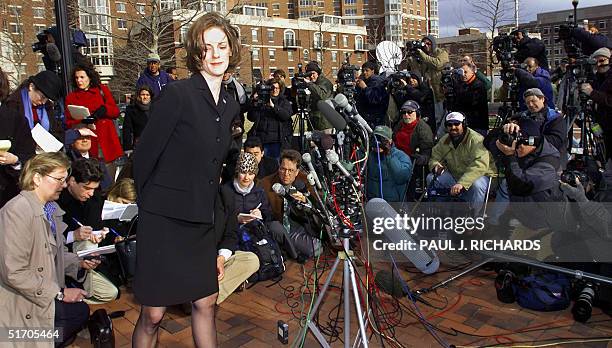 Shannon Spann , wife of CIA agent Mike Spann who was slain in Afghnistan, turns after delivering a statement to the media outside the Albert V. Bryan...