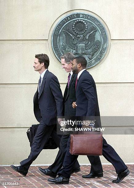 American Taliban John Walker Lindh's attorney's George Harris , Bill Cummings and Tony West walk 15 February 2002 into the Albert V. Bryan Untited...