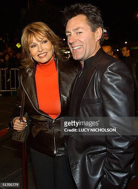 Actress Raquel Welch and her husband Richard Palmer arrive at the premiere of new film "Dragonfly," in Los Angeles, 18 February 2002. AFP PHOTO/Lucy...