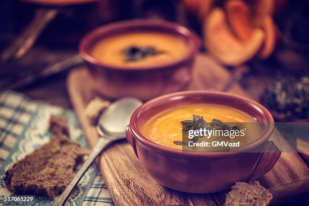 pumpkin soup for autumn days - cream soup stock pictures, royalty-free photos & images