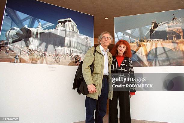 Christo and Jean-Claude pose for a photo at the National Gallery of Art in Washington, DC 29 January 2002 during a press preview for the first US...