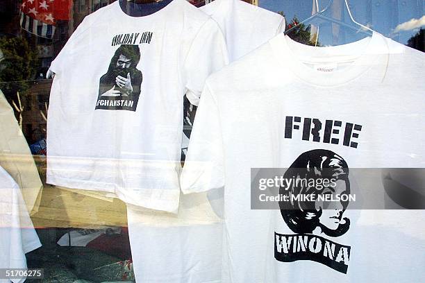 On display in a Los Angeles store window is a "Free Winona" tee-shirt and a John Walker Lindh "Holiday in Afghanistan" tee-shirt 29 January 2002....