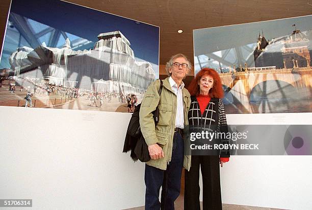 Christo and Jeanne-Claude pose for a photo at the National Gallery of Art in Washington, DC 29 January 2002 during a press preview for the first US...