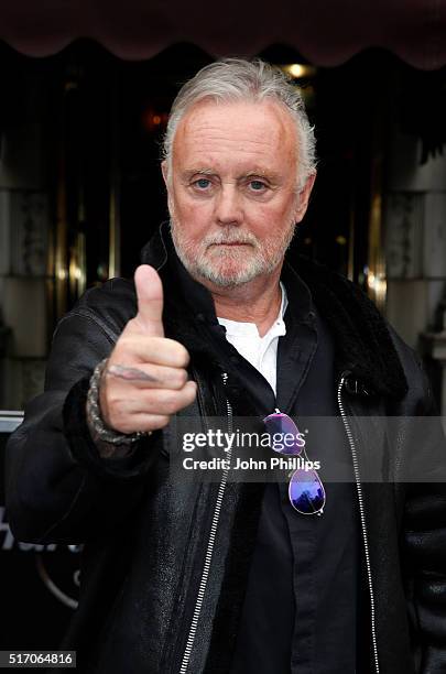 Queen's Roger Taylor accepts a £50,000 cheque donated from the Hard Rock Cafe to the Mercury Phoenix Trust at Hard Rock Cafe, Old Park Lane on March...