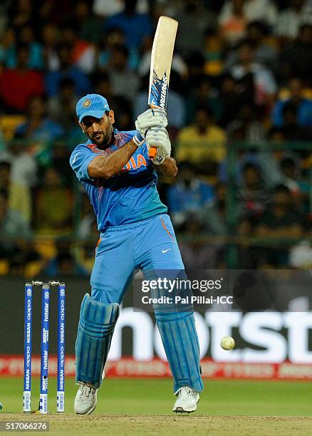 Dhoni of India bats during the ICC World Twenty20 India 2016 match between India and Bangladesh at the Chinnaswamy stadium on March 23, 2016 in...