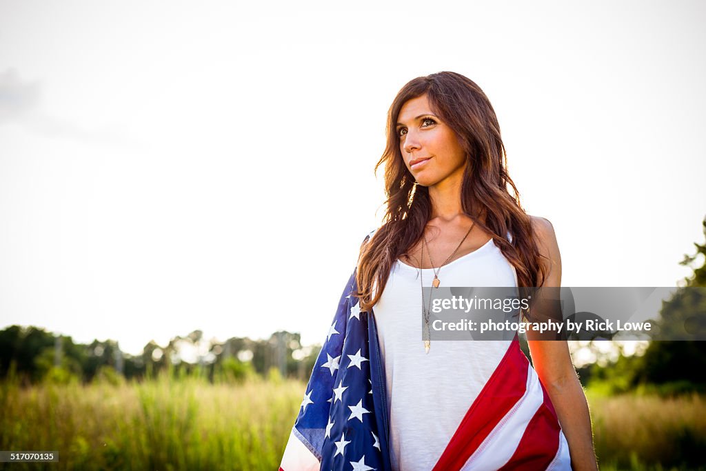 Patriotic woman with American Flag