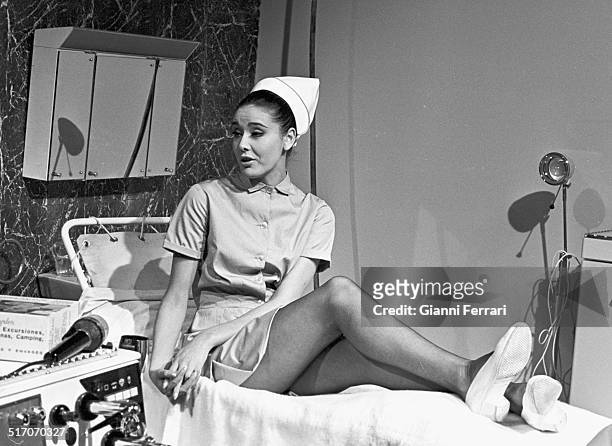 The model Paquita Torres, Miss Europe 1967, during the filming of the movie "Los que tocan el piano" Madrid, Spain..