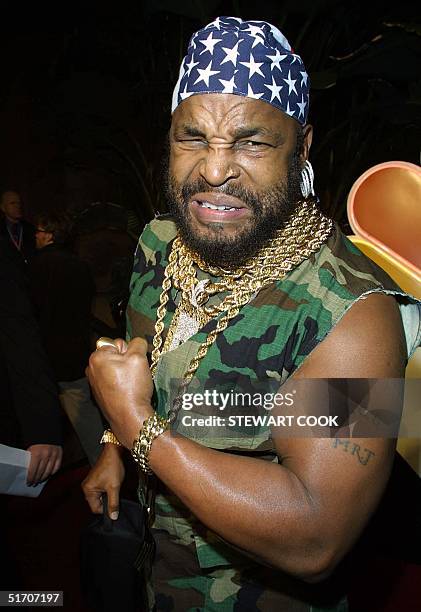 Mr. T, star of the former television series the A Team, shows his celebrated muscles at NBC's 75th anniversary all-star reception held at the Garden...