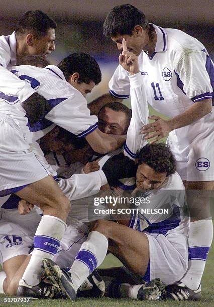 Santos Cabrera of El Salvador is congratulated by teamates after scoring a goal against Guatemala during the second half of their Gold Cup match at...