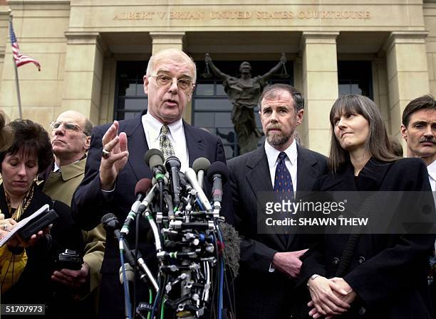 John Walker Lindh's attorney James Brosnahan, with Walkers parents Frank Lindh and Marilyn Walker, speak to the press 24 January 2002 after Walker...