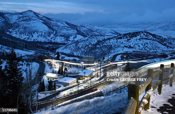 The bobsled track winds through the Olympic Park at dusk in Park City, Utah, 21 December, 2001. This will be one of the venues for the 2002 Winter...