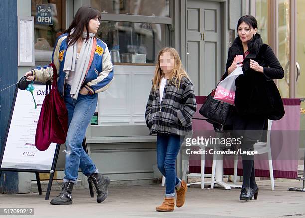 Daisy Lowe is pictured out with her mother Pearl Lowe and half sister Betty Goffey on March 18, 2016 in London, England.