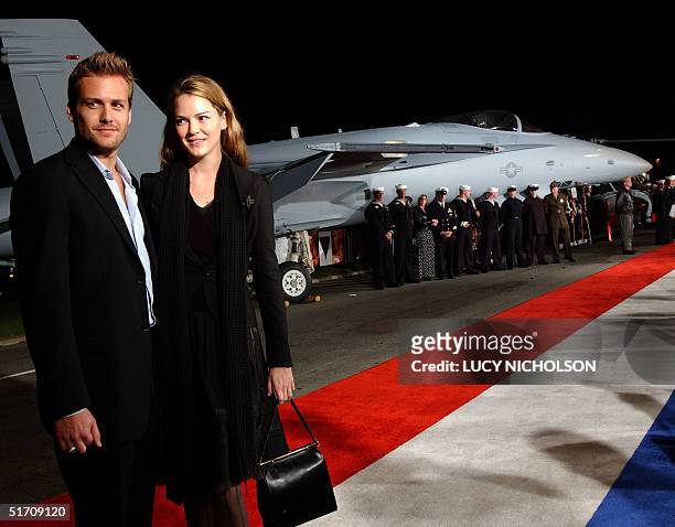 Actor Gabriel Macht arrives at the premiere of his new film "Behind Enemy Lines" with his unidentified girlfriend, in Coronado, CA, 17 November,...