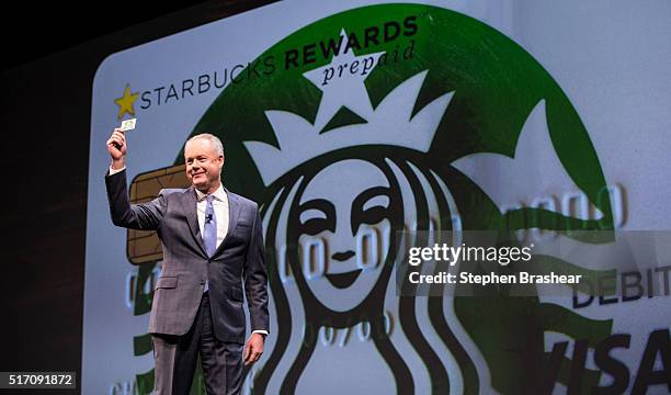 Starbucks COO Kevin Johnson introduces the Starbucks Rewards Prepaid Visa Debit Card during the Starbucks Annual Shareholders Meeting on March 23,...