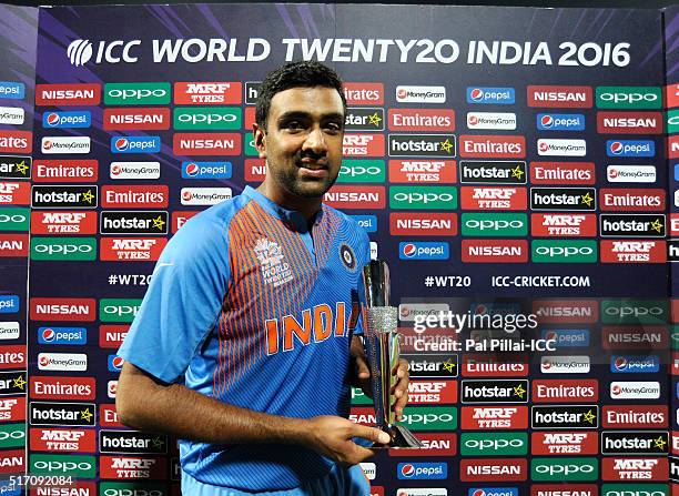 Ashwin of India poses with his man of the match trophy during the ICC World Twenty20 India 2016 match between India and Bangladesh at the Chinnaswamy...