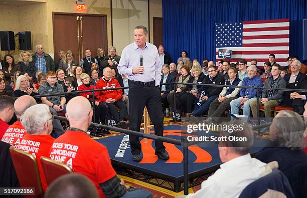 Republican presidential candidate Ohio Gov. John Kasich speaks at a campaign rally at the Crowne Plaza Milwaukee West hotel on March 23, 2016 in...