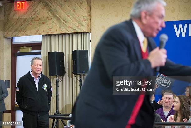 Republican presidential candidate Ohio Gov. John Kasich is introduced at a campaign rally by former Wisconsin Gov. Tommy Thompson at the Crowne Plaza...