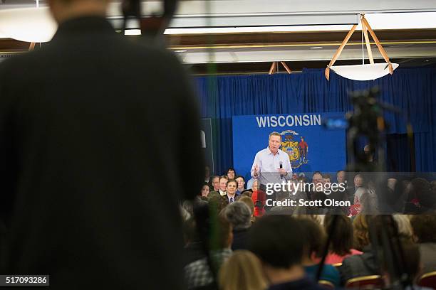 Republican presidential candidate Ohio Gov. John Kasich speaks at a campaign rally at the Crowne Plaza Milwaukee West hotel on March 23, 2016 in...