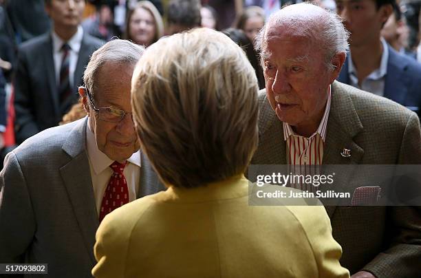 Democratic presidential candidate former Secretary of State Hillary Clinton talks with former Secretary of Defense William Perry and former Secretary...