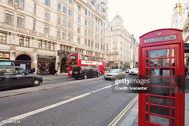 the strand in london with telephone booth - the strand london stock pictures, royalty-free photos & images