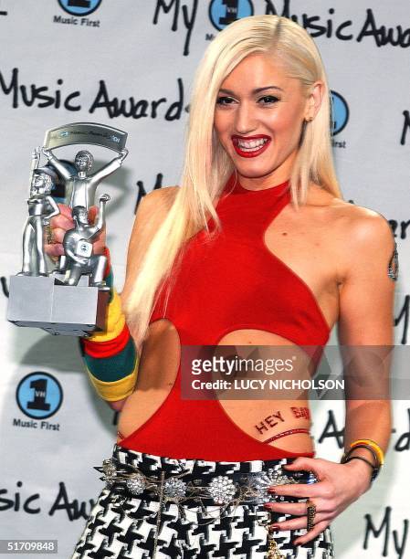 Singer Gwen Stefani of the group "No Doubt" poses with her award for "My Favorite Female" at "My VH1 Awards '01," at the Shrine Auditorium in Los...