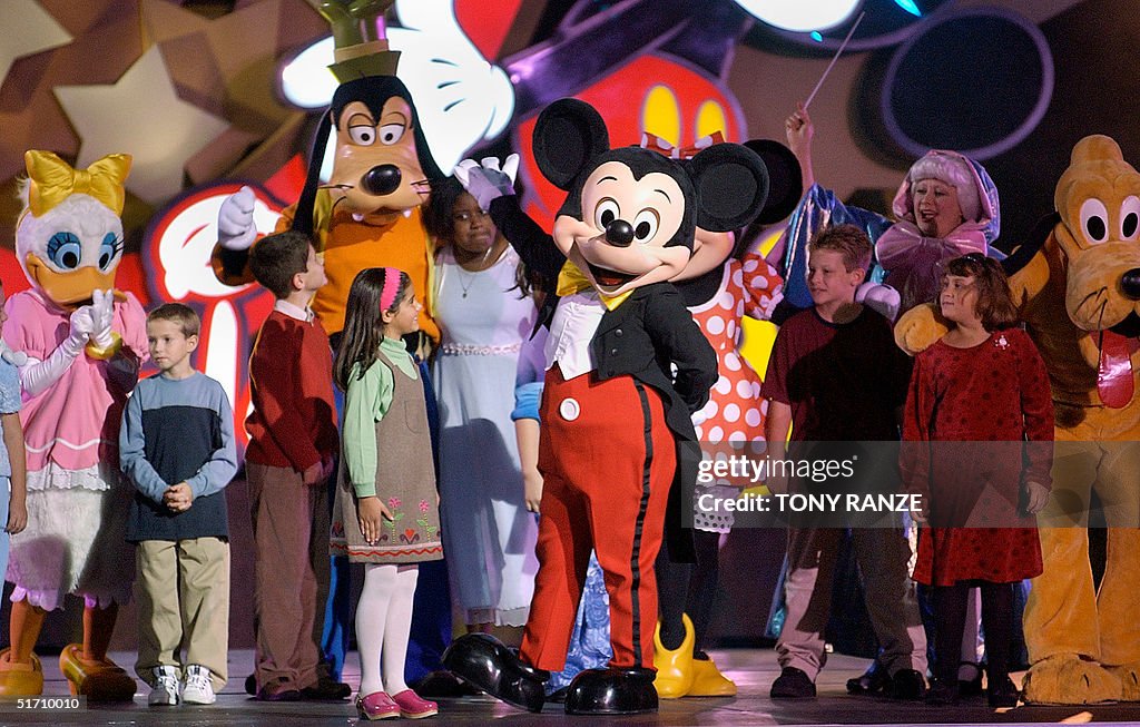Mickey Mouse performs during the "100 Years of Magic" celebration at