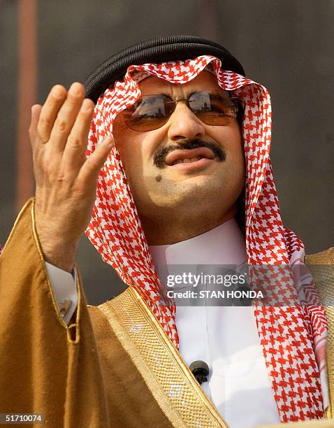 One month after the terrorist attacks on the World Trade Center, Prince Alwaleed Bin Talal Bin AbdulAziz of Saudi Arabia views the activity at ground...