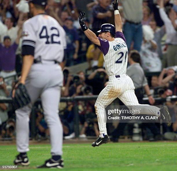 Arizona Diamondbacks left fielder Luis Gonzalez celebrates his game-winning RBI single in the bottom of the 9th inning off of New York Yankees relief...